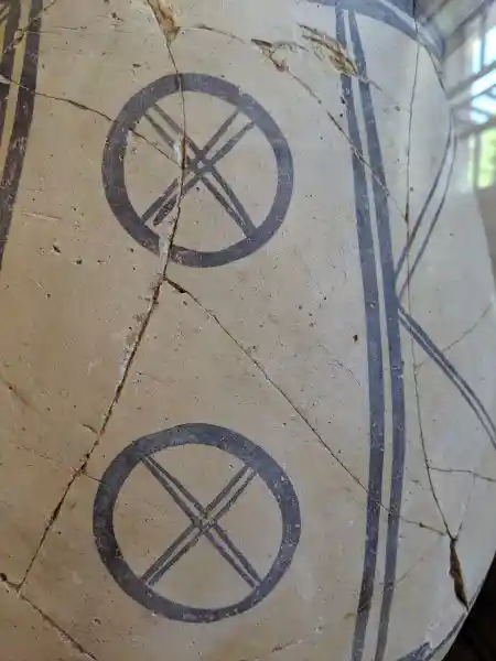 Close up of Middle Helladic pithoid jar with cross symbols